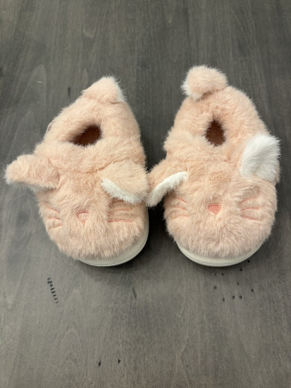 Toddler/kid fun and comfy slippers.  Reinforced sole for stability. Size 7/8 NEW